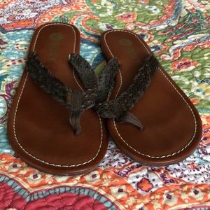 Brown Roxy flip flops